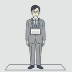 胸に大きな名札を下げて正面に立つ会社員のイラスト