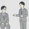 椅子に座った会社員に、立っている人が手を差し出して話しかけているイラスト